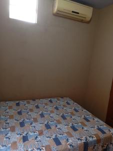 Кровать или кровати в номере HOSPEDARIA ITAPUÃ