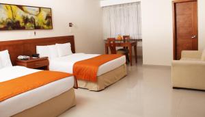 Кровать или кровати в номере Hotel Tativan