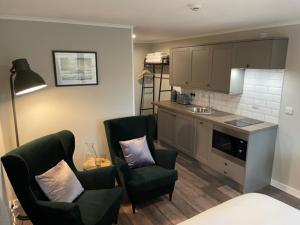 Η κουζίνα ή μικρή κουζίνα στο Midgarth House Apartments