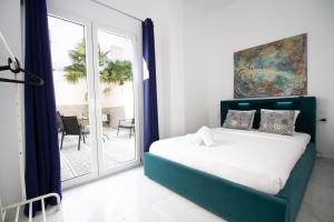 מיטה או מיטות בחדר ב-Art Apartments Alicante