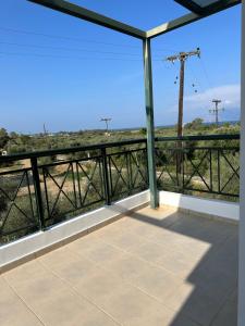 Balkón nebo terasa v ubytování ΔΩΜΑΤΙΟ ΧΑΛΑΡΩΣΗΣ ΜΕ θέα και ησυχία
