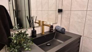 Et badeværelse på Moderne cityleilighet Sogndal
