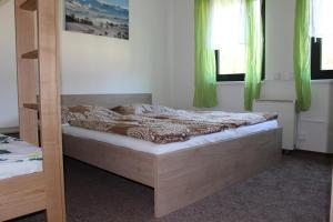 Postel nebo postele na pokoji v ubytování Tauplitz Apartment