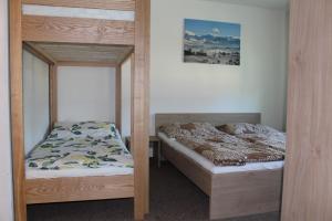 Postel nebo postele na pokoji v ubytování Tauplitz Apartment