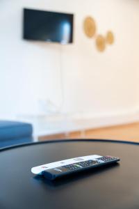 Televízia a/alebo spoločenská miestnosť v ubytovaní Luxury Penthouse - Augarten