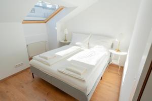 Posteľ alebo postele v izbe v ubytovaní Luxury Penthouse - Augarten