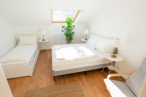 Posteľ alebo postele v izbe v ubytovaní Luxury Penthouse - Augarten