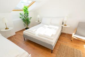 Posteľ alebo postele v izbe v ubytovaní Luxury Penthouse - Augarten + 37 fotografií