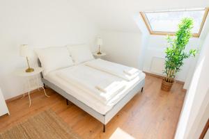 Posteľ alebo postele v izbe v ubytovaní Luxury Penthouse - Augarten