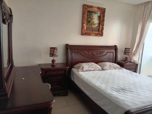 Кровать или кровати в номере Appartement Islane Agadir avec piscine