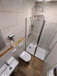 Koupelna v ubytování Hotel am Rathaus