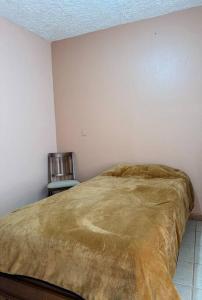 Krevet ili kreveti u jedinici u okviru objekta Departamento La Comarca 2