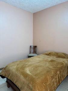 Departamento La Comarca 2 tesisinde bir odada yatak veya yataklar