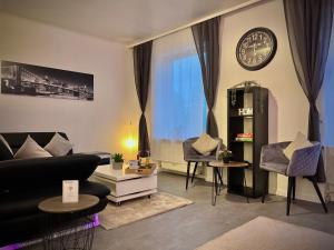 Posezení v ubytování G&G Luxury Apartment am Stadtpark Bendorf + 34 fotografií