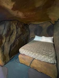 Postel nebo postele na pokoji v ubytování Caverna El Mirador - La Mesa
