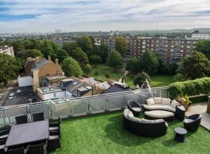 a view from the roof of a house with a lawn at OMG PentHouse in London