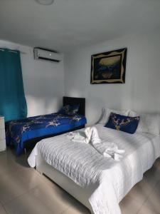 Ένα ή περισσότερα κρεβάτια σε δωμάτιο στο Sol Caribbean Beach Corales