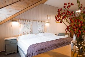 Ένα ή περισσότερα κρεβάτια σε δωμάτιο στο Hotel Maxant