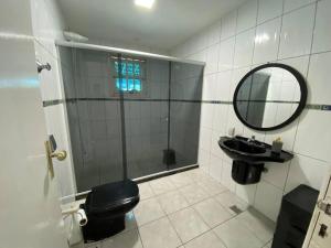 Ванная комната в Casa de frente para o mar Saquarema /Haus am Meer