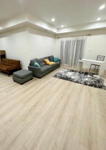 a living room with a couch and a table at Qazaq Hostel in Los Angeles