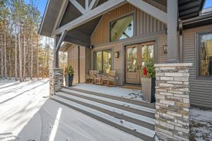 a front porch of a home with a wooden house at The Belle Retreat in Center City