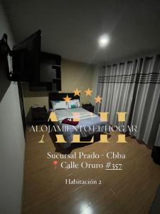 a bedroom with a bed with stars on it at Alojamiento El Hogar Casa completa - Prado - Centro Cbba in Cochabamba