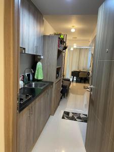 A kitchen or kitchenette at JJ'S CONDOTEL