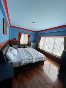Hotel De Purang客房内的一张或多张床位