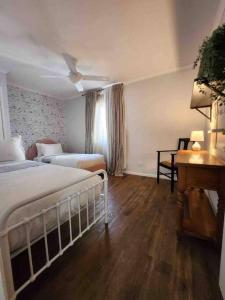 a hotel room with a bed and a desk at South Brisbane modern apartment in Brisbane