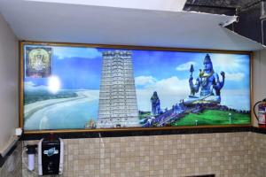 En tv och/eller ett underhållningssystem på Jaya Paradise