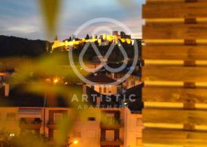 a view of a building with a castle in the background at 2 bedrooms appartement at Tomar in Tomar