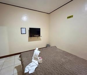 Postel nebo postele na pokoji v ubytování Elegance Guesthouse