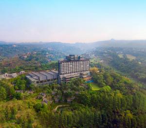 an aerial view of a building on a hill at InterContinental Bandung Dago Pakar, an IHG Hotel in Bandung