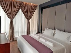 Postel nebo postele na pokoji v ubytování WIWO Hotel + 21 fotografií