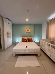 Postel nebo postele na pokoji v ubytování Creole Pearl Self-Catering