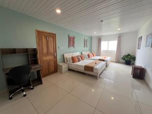 Postel nebo postele na pokoji v ubytování Creole Pearl Self-Catering