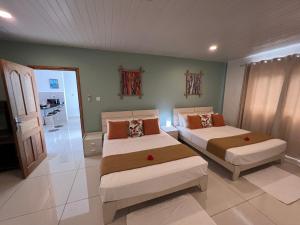 Postel nebo postele na pokoji v ubytování Creole Pearl Self-Catering