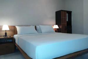Postel nebo postele na pokoji v ubytování Taste of Bali Hostel