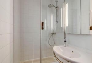 a bathroom with a shower and a sink at B&B HOTEL Montluçon Saint-Victor in Saint-Victor