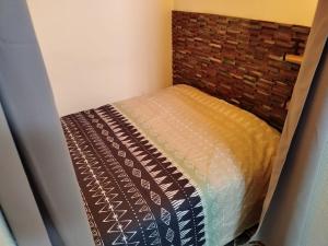 Postel nebo postele na pokoji v ubytování Spacieux studio confortable