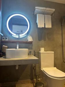 Ένα μπάνιο στο BK Beach Boutique Hotel - Hikkaduwa