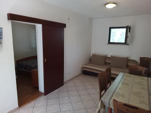 Posezení v ubytování Apartments Gorenjka