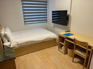 Katil atau katil-katil dalam bilik di Business hotel ARM Futaba
