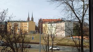 a view from a window of a city with buildings at katedrahouse in Wrocław