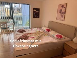 Posteľ alebo postele v izbe v ubytovaní Wohnen beim Stadtpark