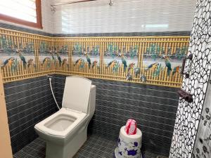 Koupelna v ubytování Sai Ayush Homestay