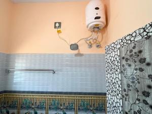 Koupelna v ubytování Sai Ayush Homestay