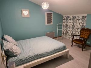 Postel nebo postele na pokoji v ubytování Gîte Cinqcy 2 + 4 fotografie