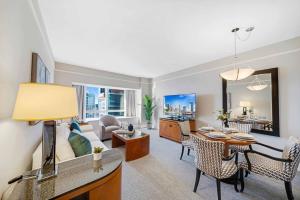 a living room with a couch and a table at 1435 Brickell Ave 3004 in Miami