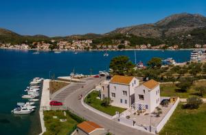 arial view of a harbor with boats in the water at Luxury Seaview Apartment - Mare in Slano